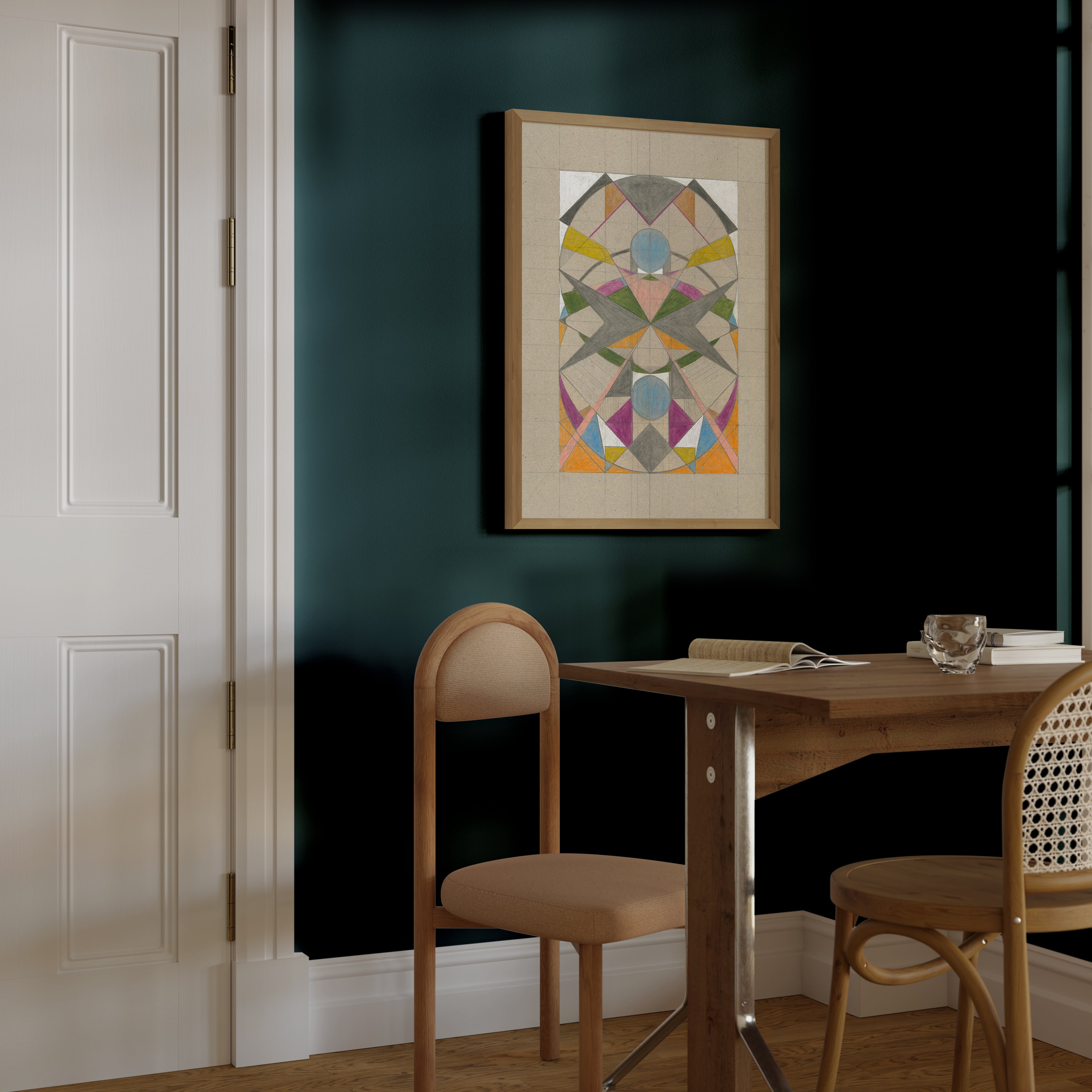 Dining area with a wooden table and chairs against a dark green wall with a colorful abstract painting.