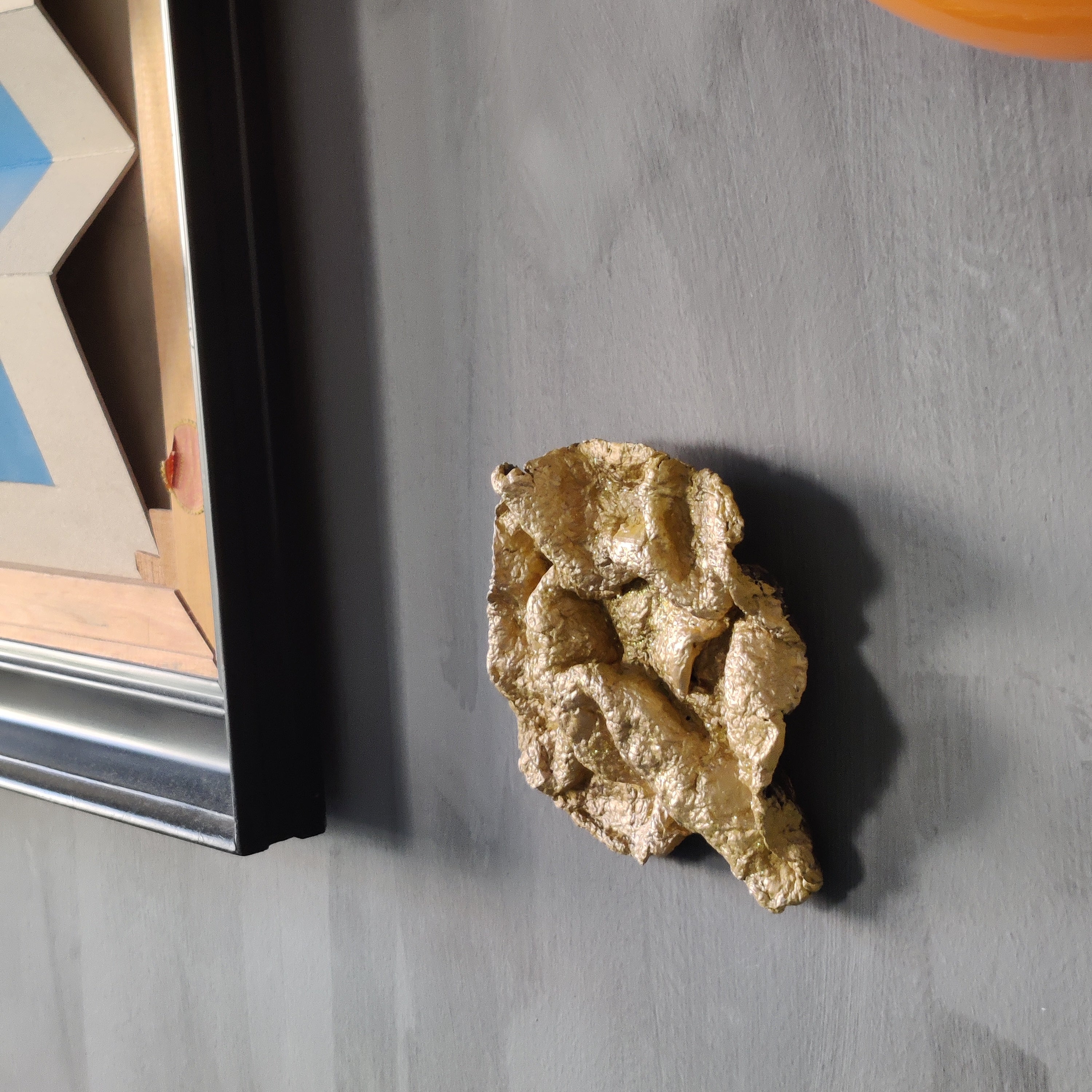 Golden paper pulp wallart