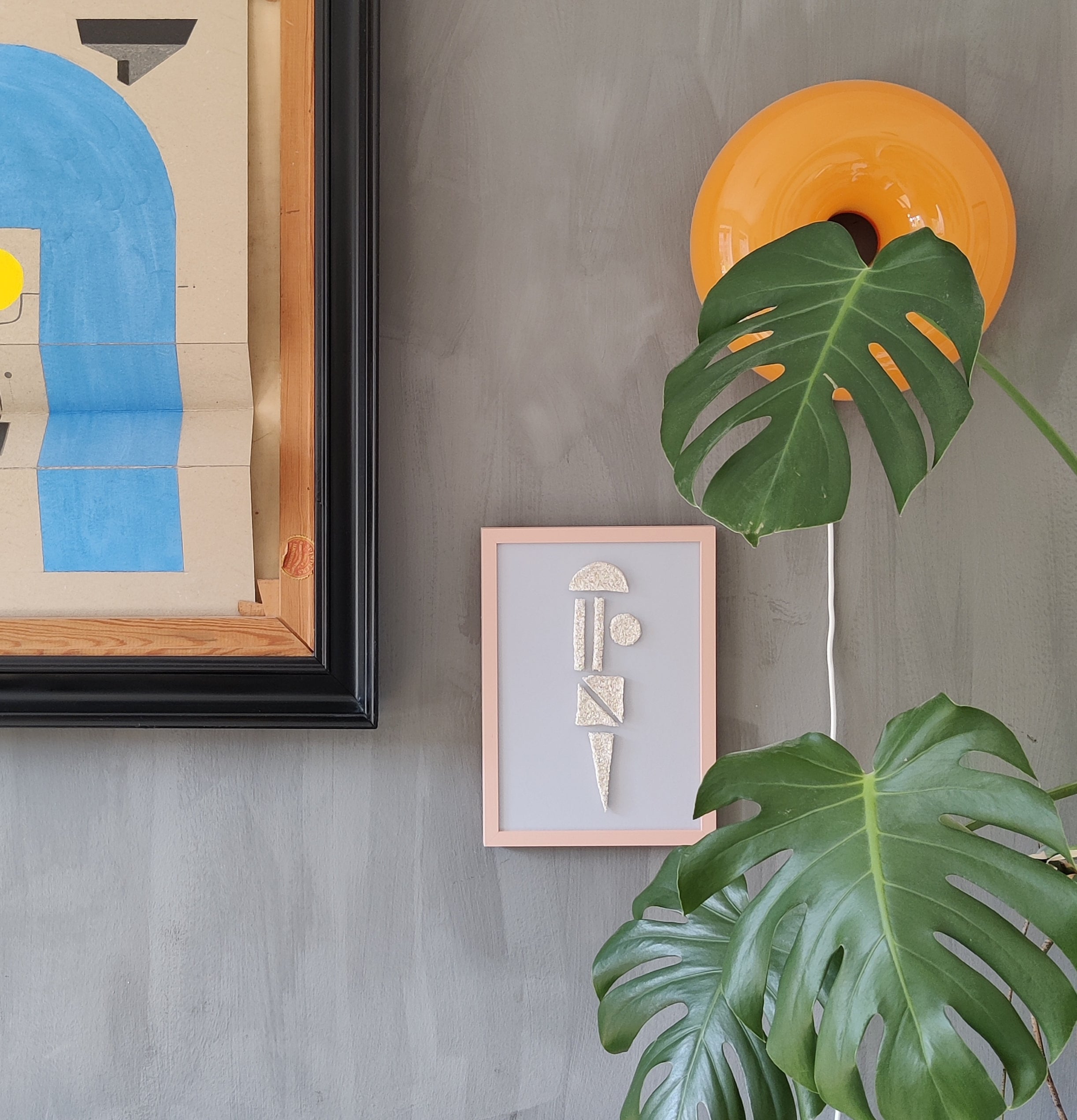 Abstract cardboard and pulp art in a warm minimalist living space
