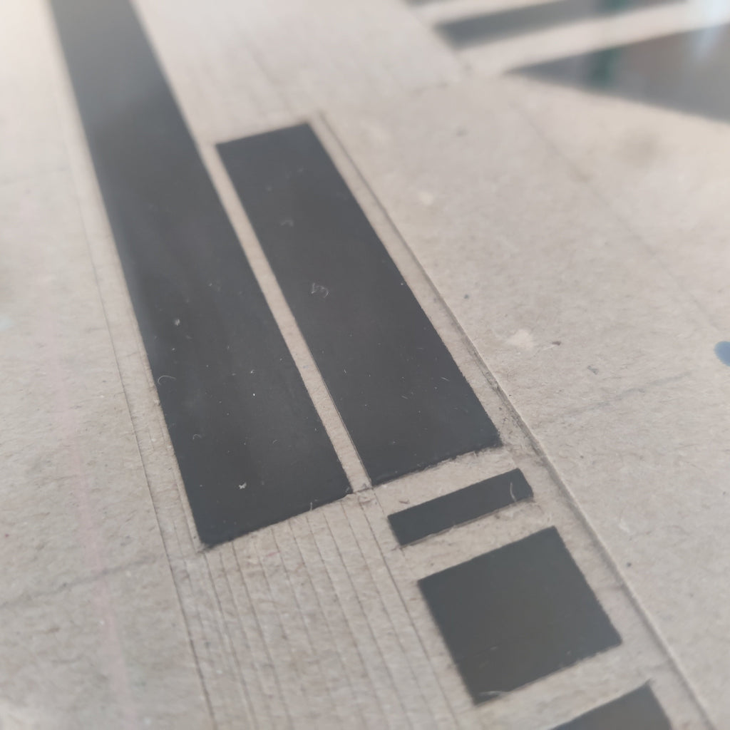 Original shape on cardboard close up 05