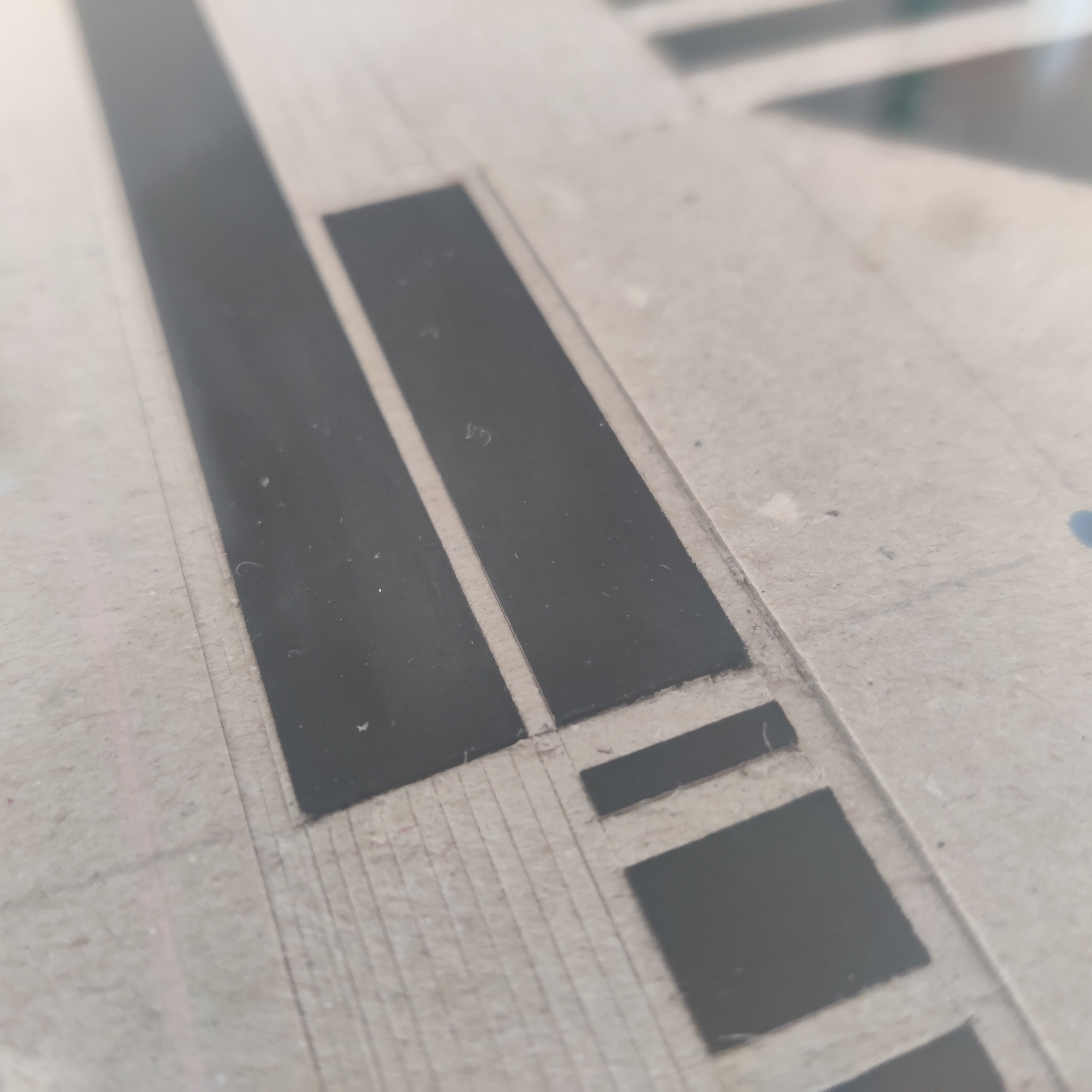 Original shape on cardboard close up 05