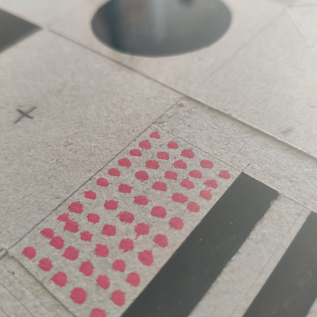 Geometric abstract relief art on cardboard - Danish sustainable design