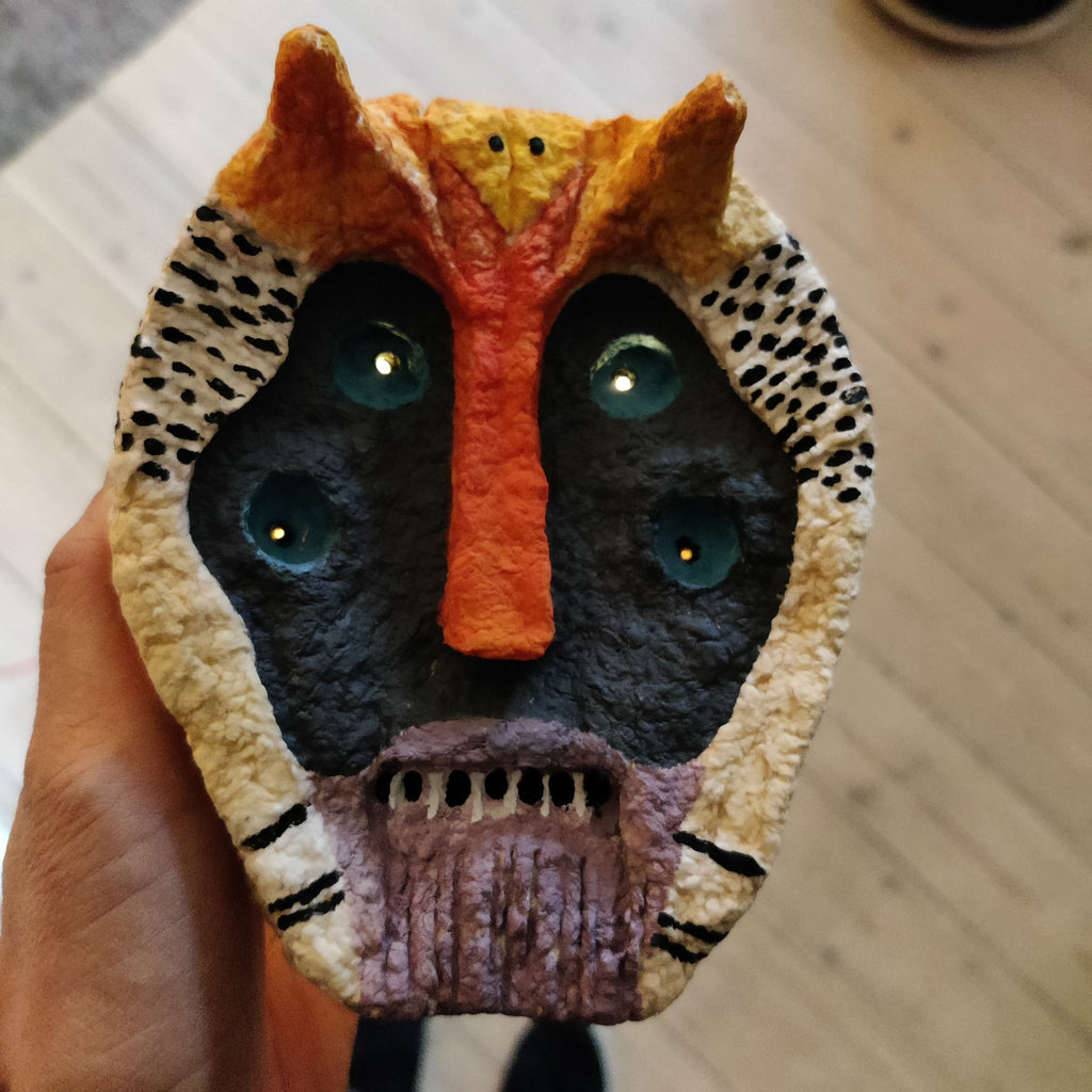 Primal Pulp Mask created with paper pulp, painted with linoleum and acryllic colours in 2025, Denmark. By Lisa ketty