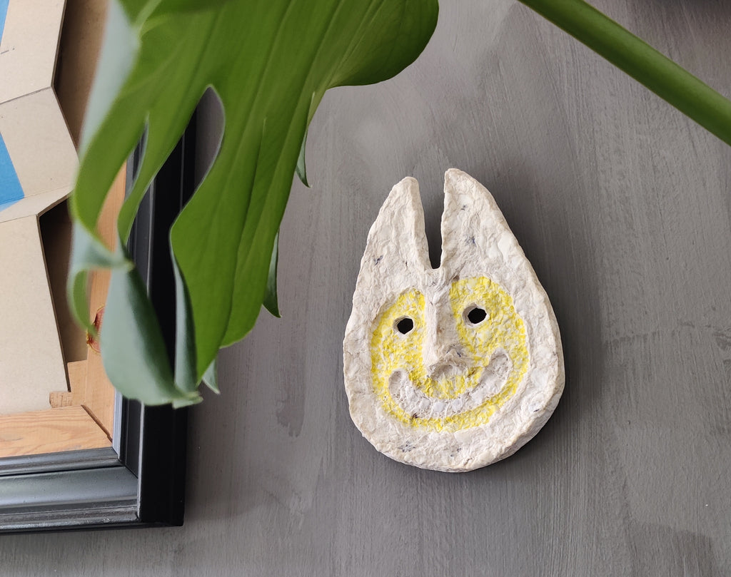 Rabbit Man paper pulp mask, side profile showing depth and texture