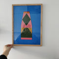 Mystical Cardboard Juice – original cardboard artwork in light oak frame by Lisa Ketty